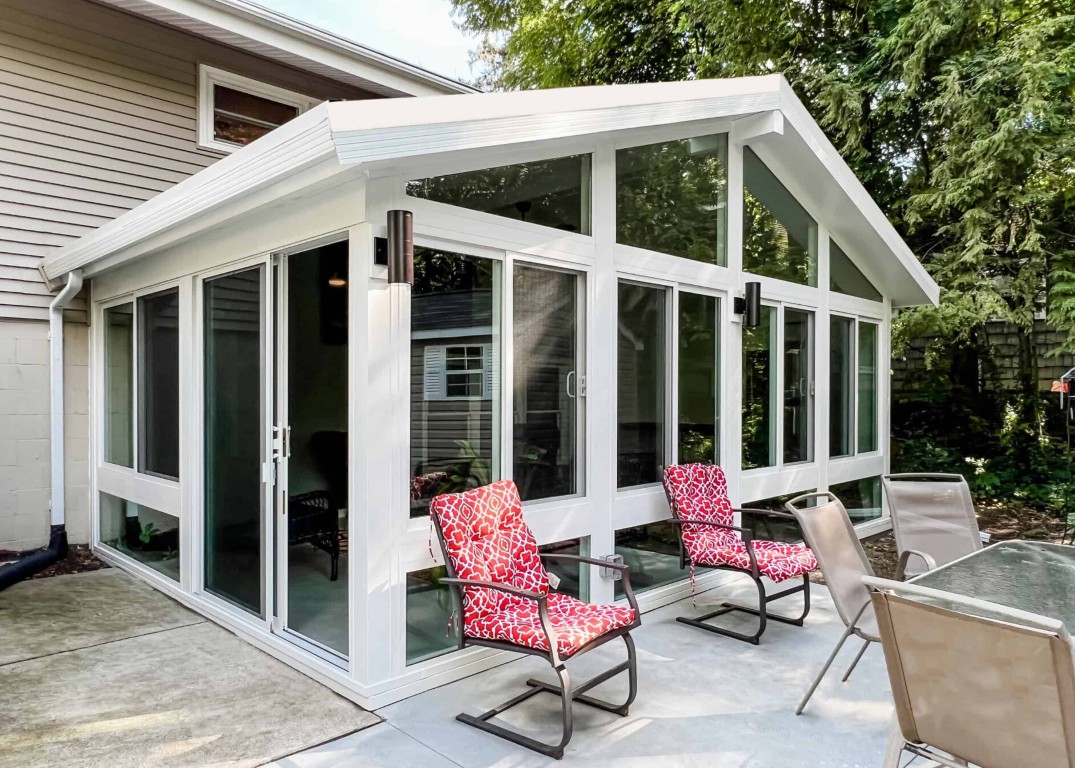 Professionally built sunroom adding space to home